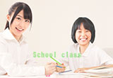 家庭教師と生徒が楽しそうに授業をしている